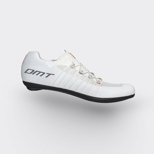 White cycling shoe with black sole on a light gray background